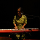 Composer Keiko Fujiie plays the keyboard during a rehearsal for the premiere of the second act of Là-bas ou Ici at the Institut Français in Ouagadougou, Burkina Faso in March.